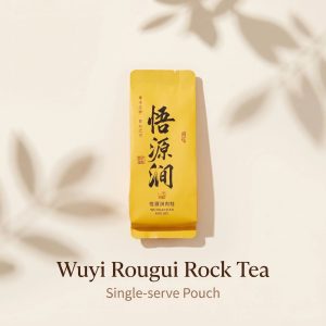 Wuyi Mountain Rougui rock tea in a single-serve pouch, featuring premium cinnamon oolong from Fujian, China.